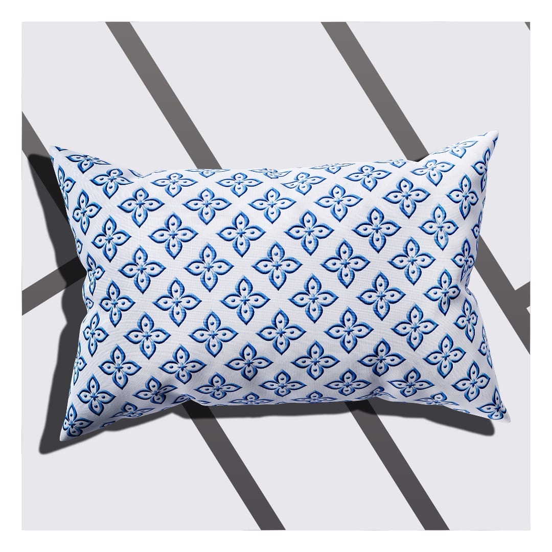 A flower printed Cushion Cover in Blue and White.