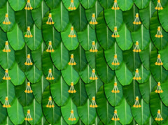 South Indian Backdrop: Texture of Banana leaf with yellow rose tassel